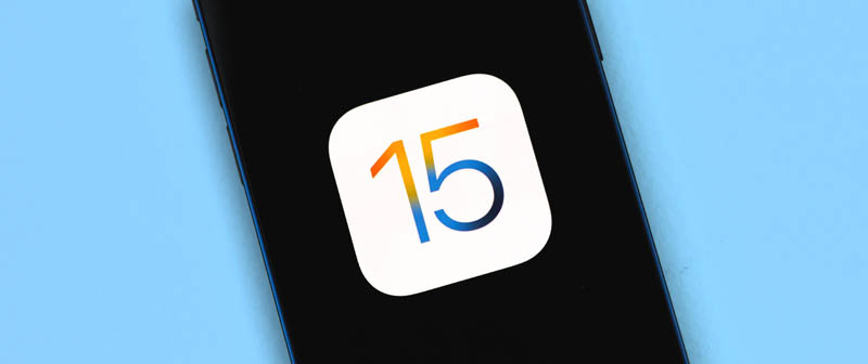 Kharkov, Ukraine - June 18, 2021: Apple software updates banner photo, iOS 15 logo icon on the screen